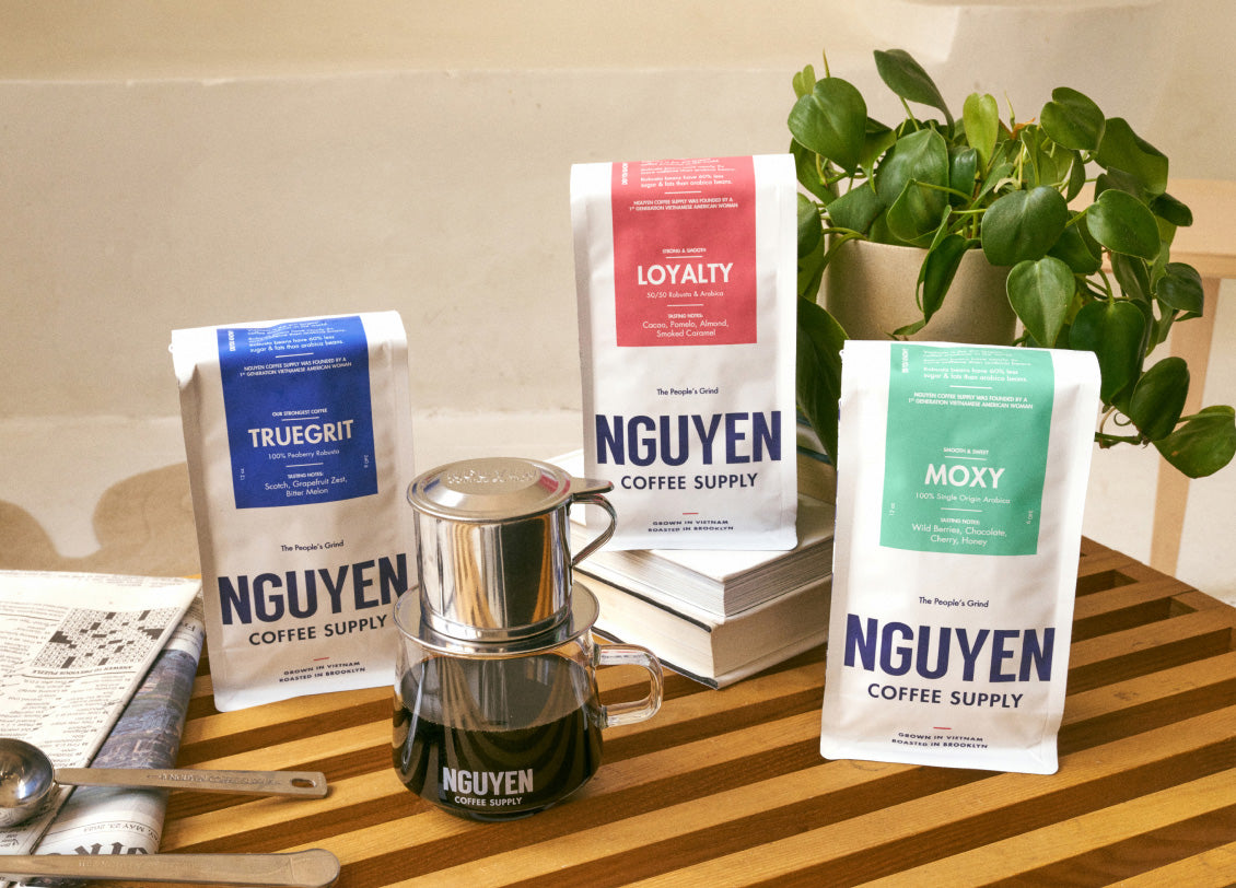 The original vietnamese coffee trio, three bags of coffee, truegrit coffee(100% pearberry robusta), loyalty coffee (100% arabica nad robusta), Moxy coffee (100% arabica), phin filter, coffee scoop set